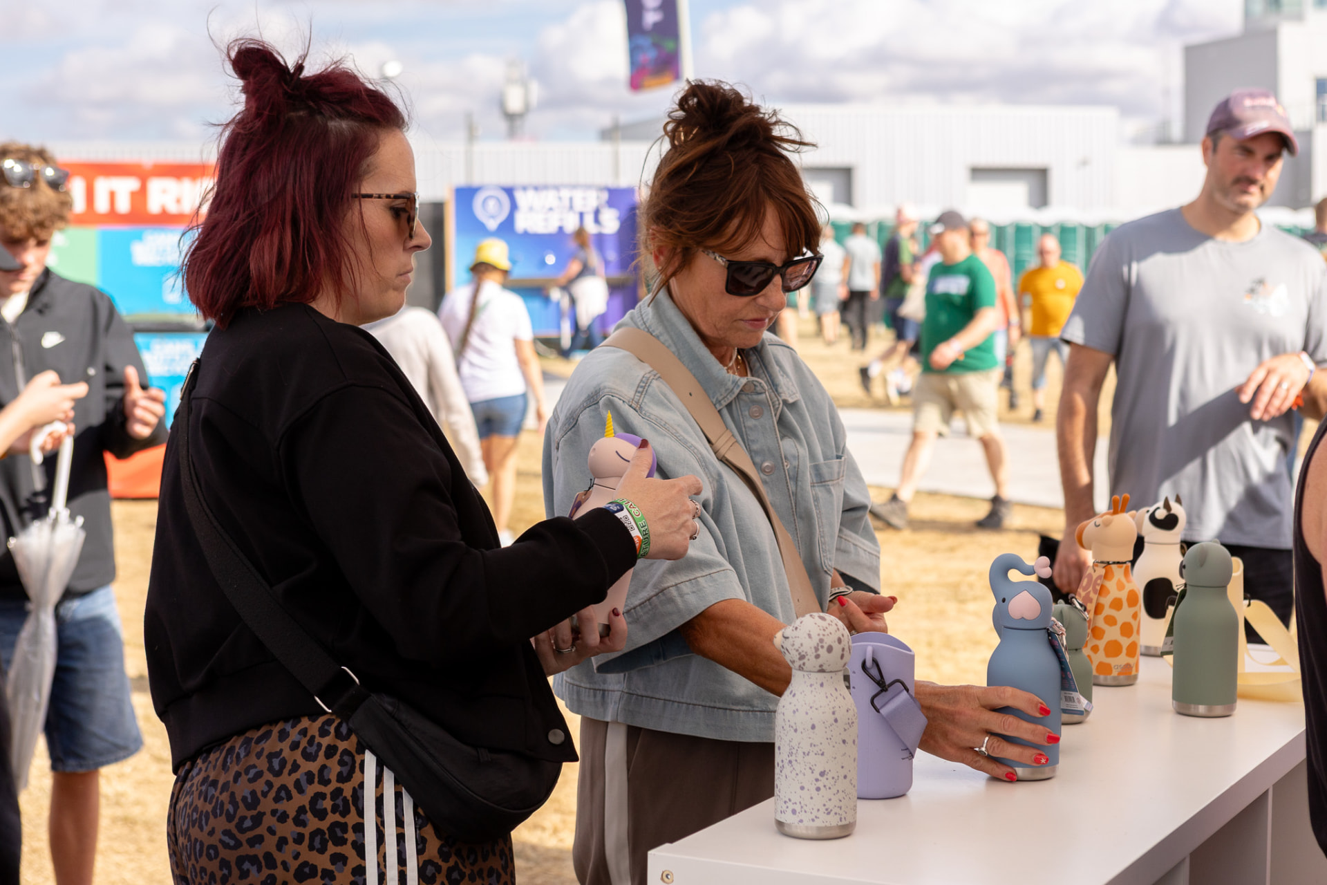 A retail activation sales professional demonstrating a product to a customer